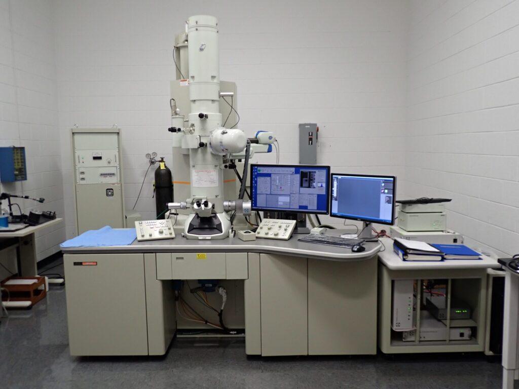 EM system setup showing electron column and control interface for ultrastructural analysis