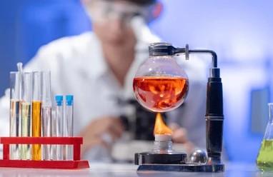 Laboratory flasks containing chemical formulations during accelerated aging studies