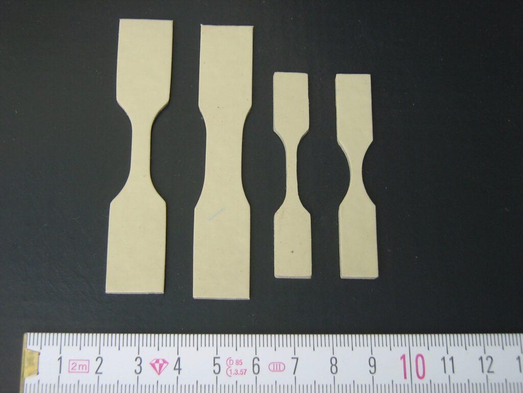 Dog-bone specimen molds prepared for tensile mechanical testing